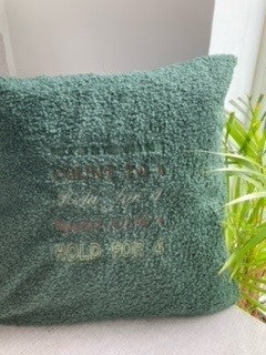 Green cushion4calm with camouflage writing